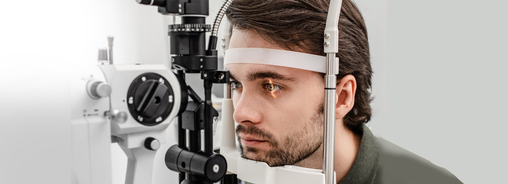 young man during eye exam in Alton